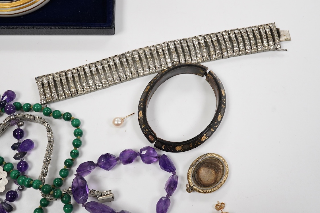 A 9ct and cabochon black onyx set pendant, on a 9ct chain, a 9ct and gem set ring and pair of 9ct and cultured pearl set ear clips, together with other items including costume jewellery, a silver bangle and a silver book